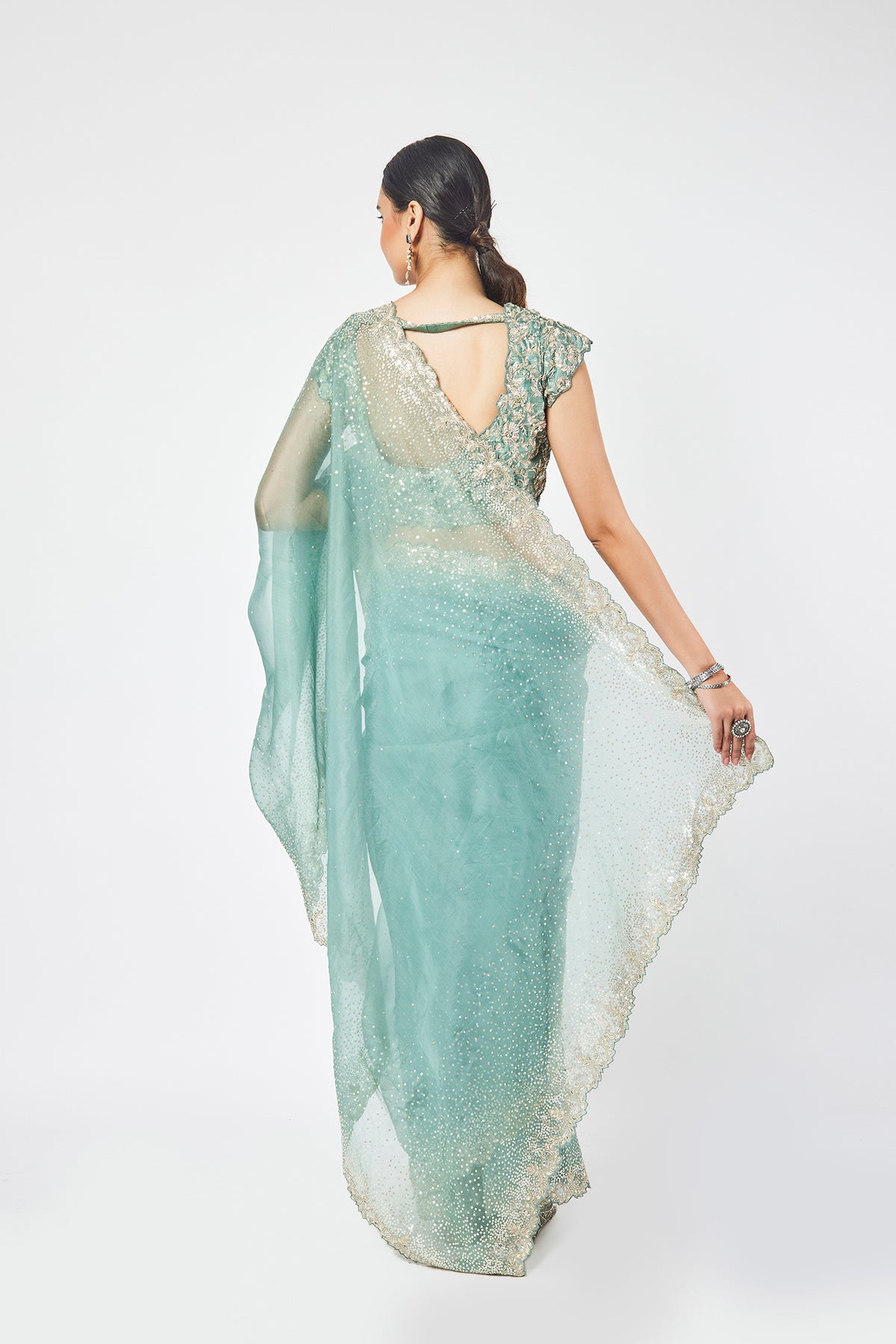 Fern Green Organza stone and cutdana work saree
