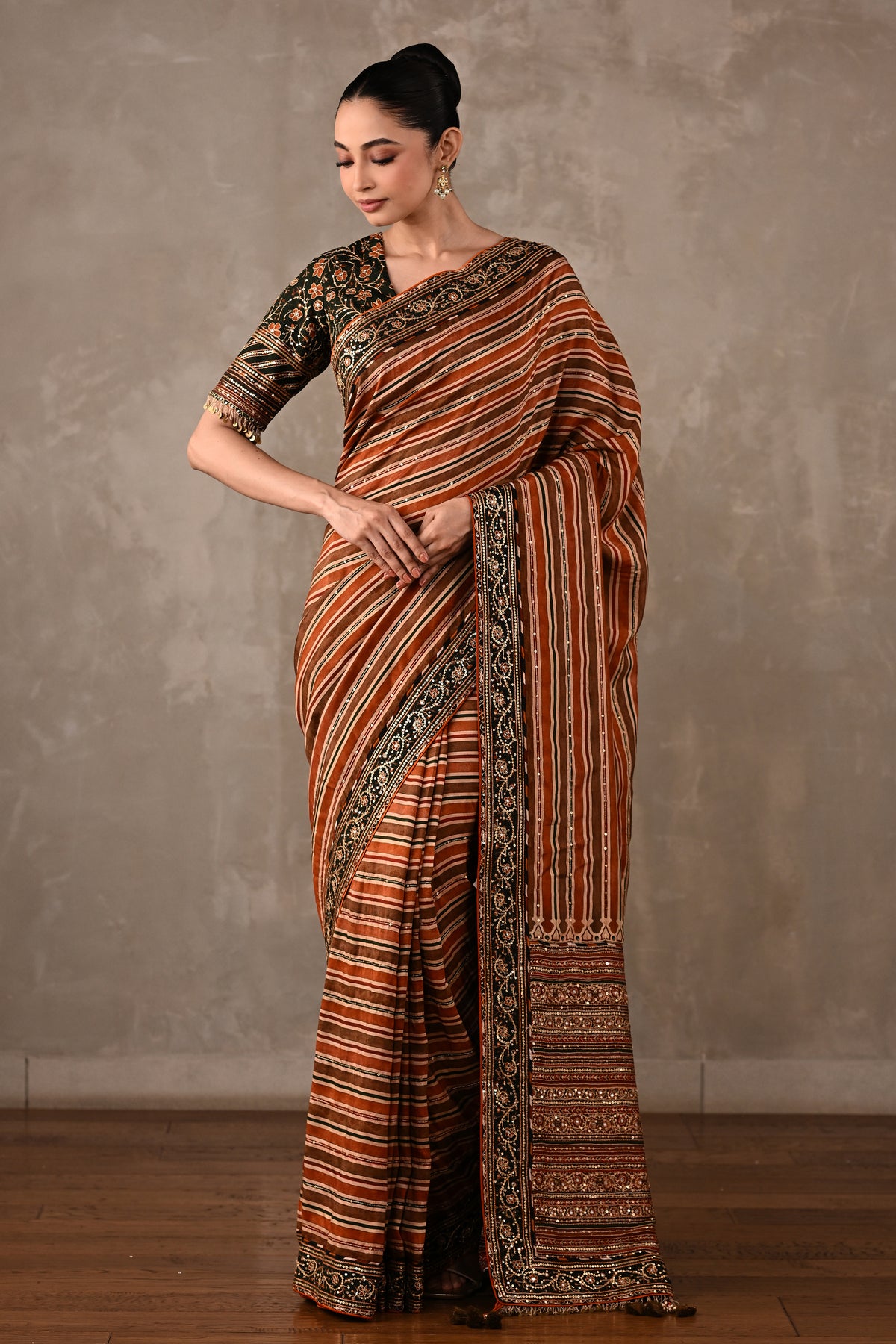 Striped Silk Saree with Embroidered Blouse